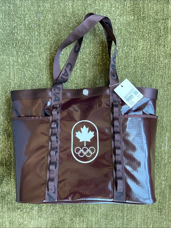 lululemon athletica Handbags - lululemon athletica Burgundy Glossy Olympic Maple Leaf Tote